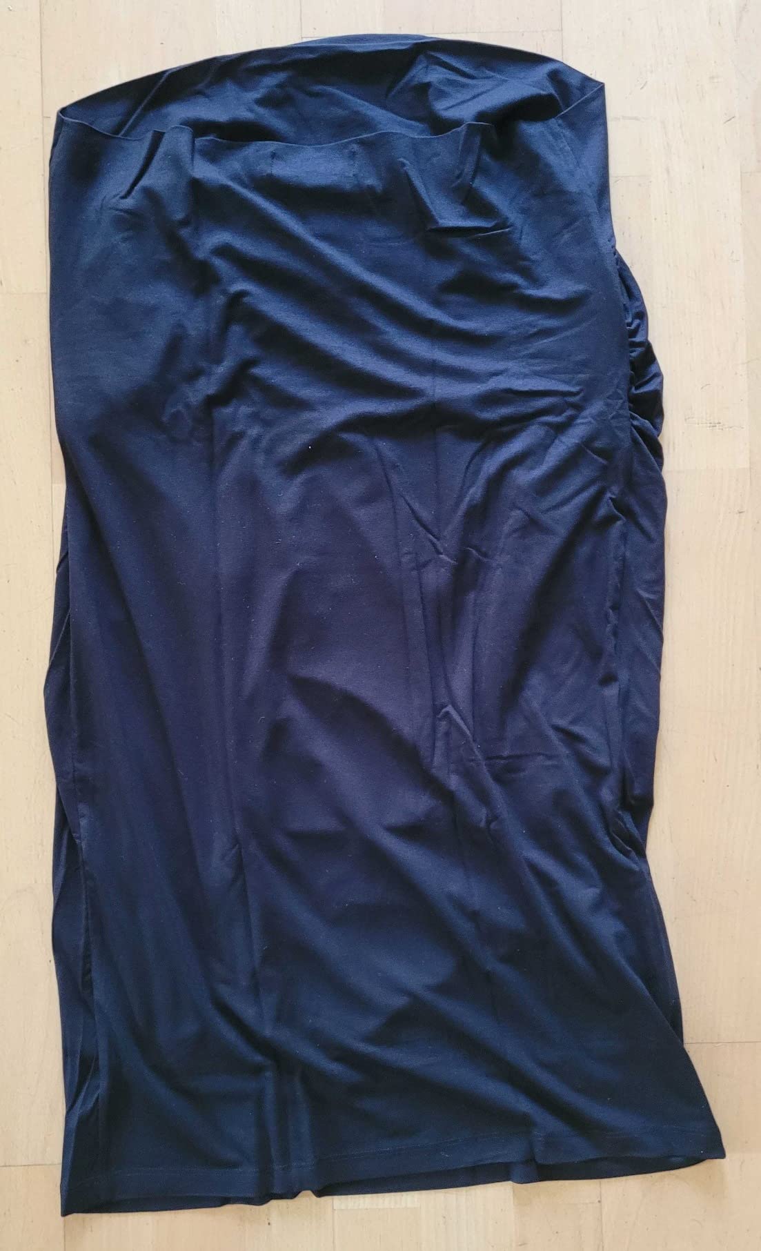 Sitzt auch mit kleinem Bauch